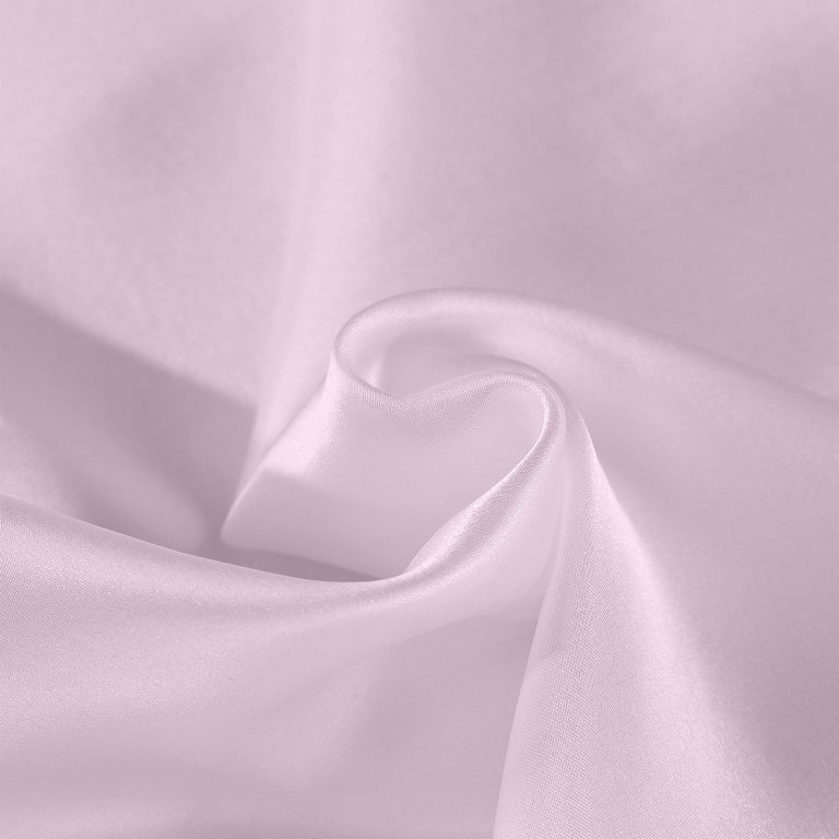 Close-up of soft pink fabric folds.
