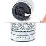 Electric diffuser with power cord and control buttons.