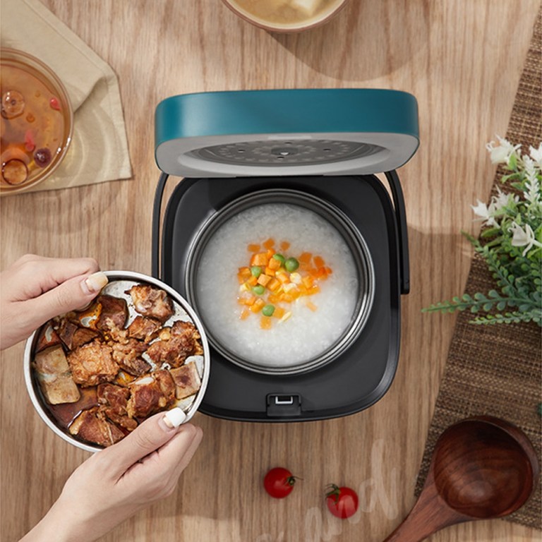 1.2l mini rice cooker travel small non stick pot for cooking soup rice stews Preparing porridge in a compact rice cooker.