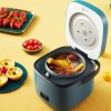 1.2l mini rice cooker travel small non stick pot for cooking soup rice stews Mini rice cooker preparing delicious meal.