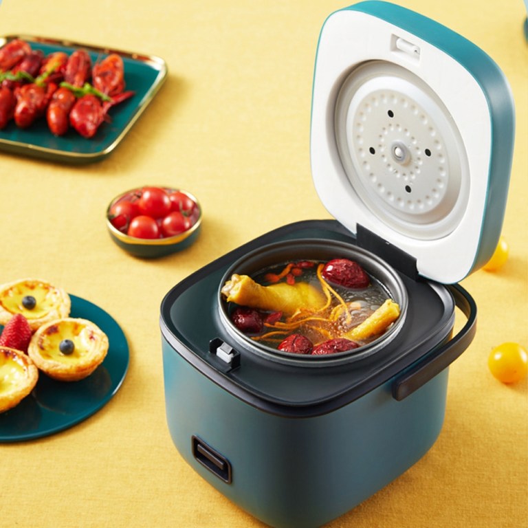 1.2l mini rice cooker travel small non stick pot for cooking soup rice stews Mini rice cooker preparing delicious meal.