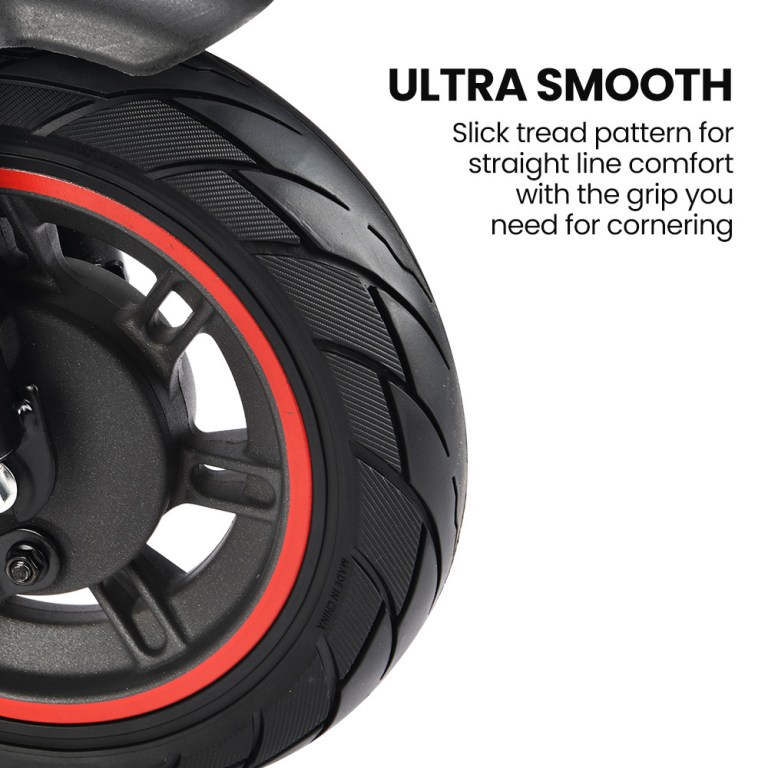 Motorcycle tyre with slick tread pattern.