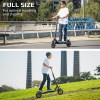 valk fusion 5 electric scooter, 500w 48v 13ah lithium 50km range 40km/h quad shocks 10 inch tyres, Person riding electric scooter for handling and stability.