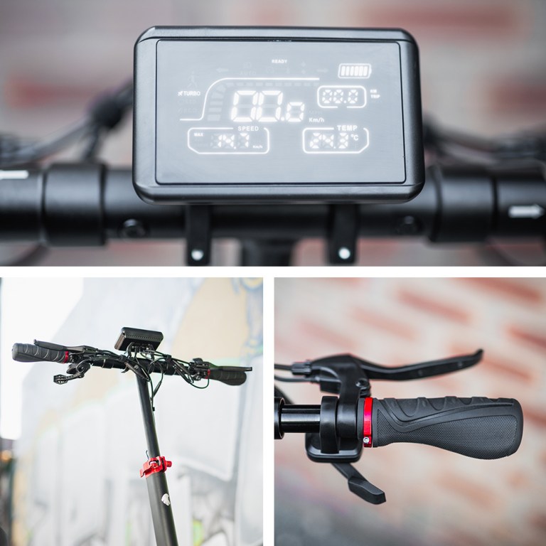 Electric scooter dashboard and handlebars close-up.