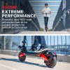 valk primal 9 dual motor 1600w extreme hill climbing electric e scooter, black/red Rider on high-performance electric scooter over bridge.
