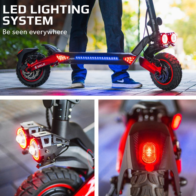 Electric scooter with LED lights on footpath.