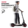 valk synergy 7 mkii 500w electric scooter 37v 15ah battery foldable e scooter adult ride on Person riding electric scooter with 500W power.