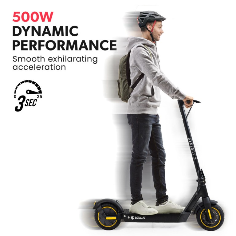 valk synergy 7 mkii 500w electric scooter 15ah 37v battery foldable e scooter adult ride on Person riding high-performance electric scooter.