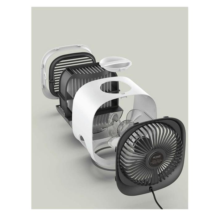 Disassembled fan with visible components on display.