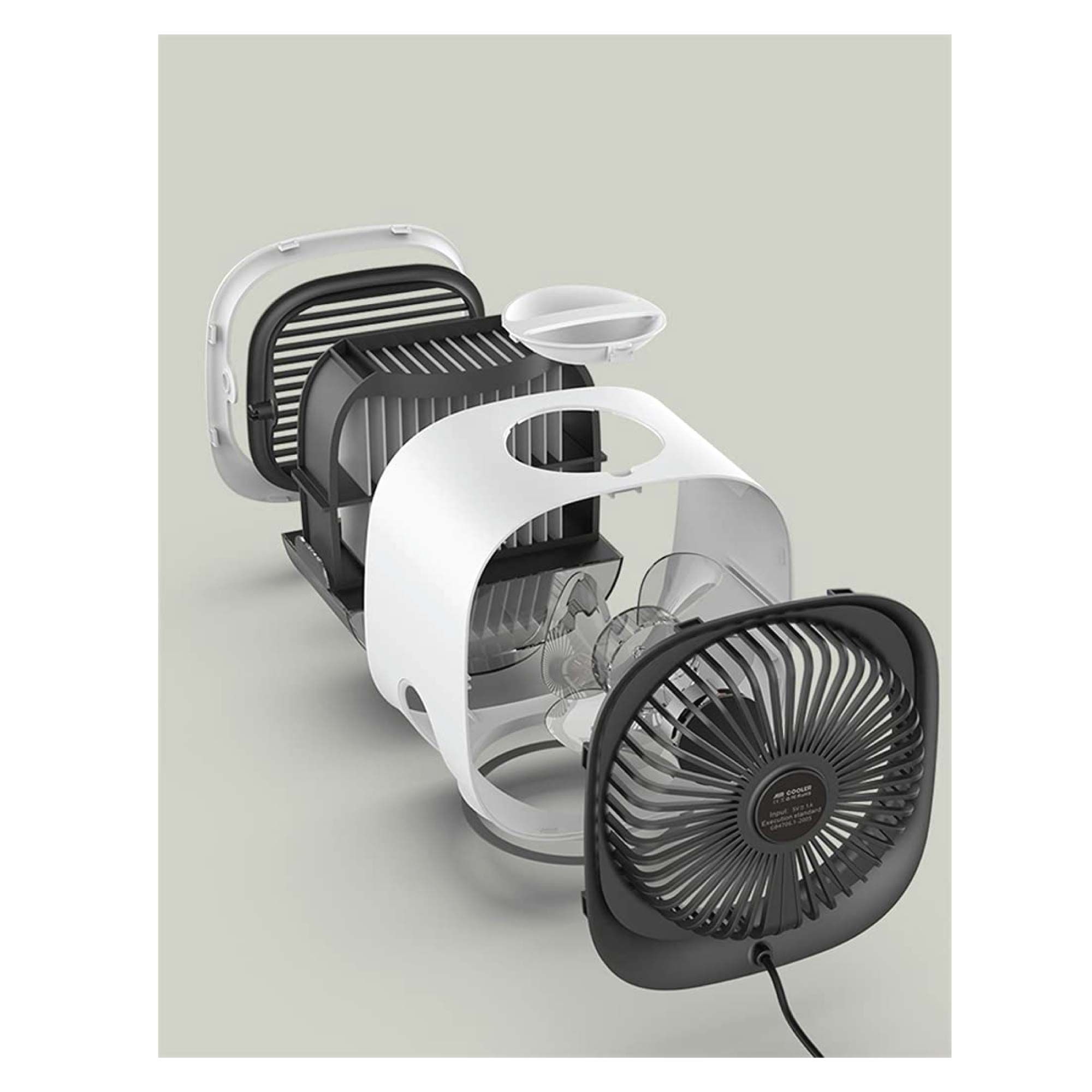 Disassembled fan with visible components on display.