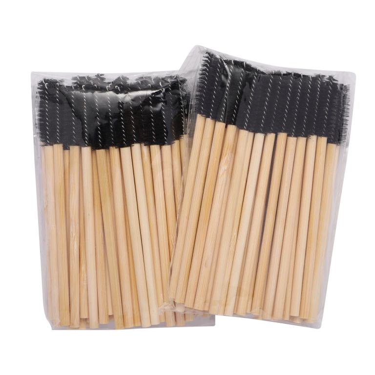 miosh eco friendly disposable eyelash mascara wands spoolies 50pcs Bulk bamboo mascara wands in packaging.