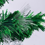 Closeup of green and white tinsel decoration.