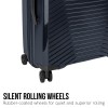 Dark suitcase with silent rolling wheels.