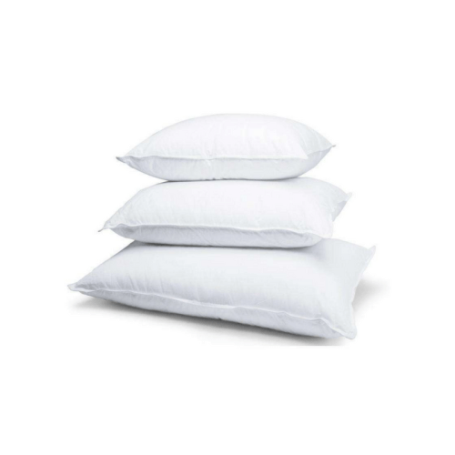 Three stacked white pillows on white background.