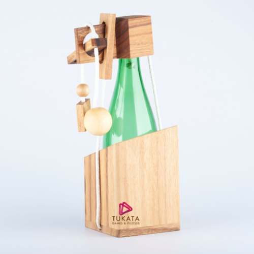 v277 bwbmlp 190258 00.jpg Wooden puzzle securing a green bottle.