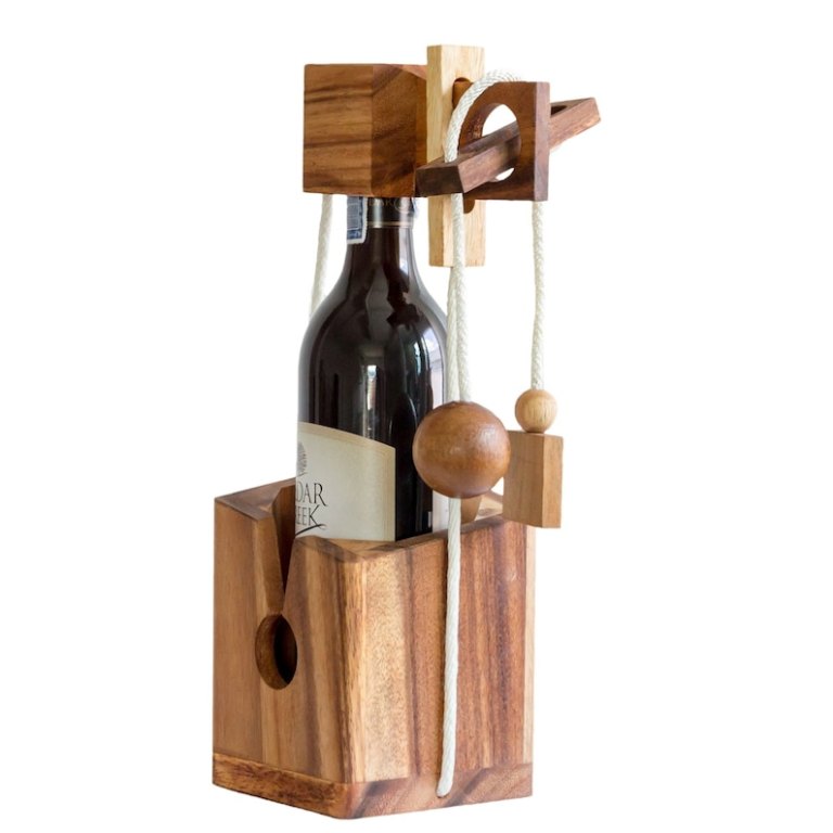 Wooden wine bottle puzzle holder with ropes.
