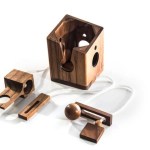 Wooden puzzle pieces with rope and ball