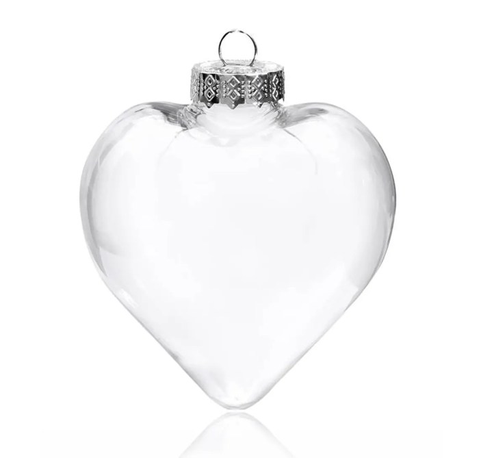 Clear glass heart ornament with silver cap.
