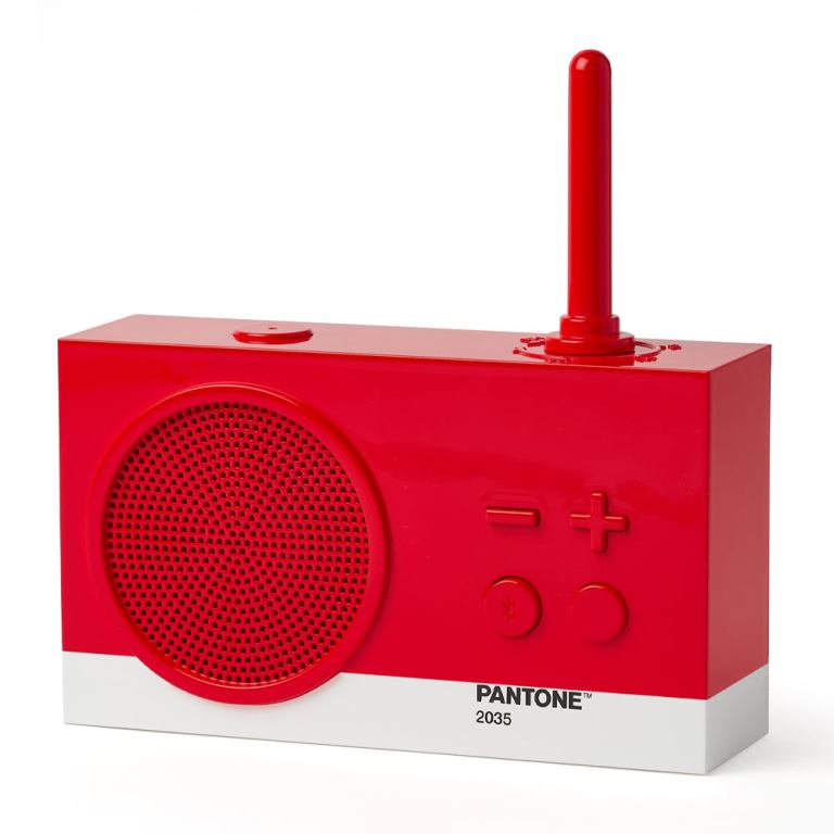 Red retro speaker with antenna and controls