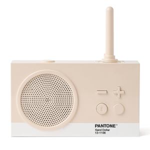 Beige retro radio with antenna and speaker.