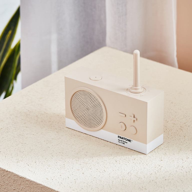 lexon thykho 3 fm radio & bluetooth speaker pantone sand Beige retro radio on textured beige surface.