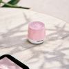 Pink Pantone Bluetooth speaker on marble table