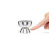 lexon tamo infinitely pairable bluetooth speaker alu polish Metal ant moai sculpture next to finger for scale.