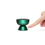 lexon tamo infinitely pairable bluetooth speaker green Green incense burner with fingertip beside it.