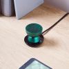 lexon tamo infinitely pairable bluetooth speaker green Green desktop speaker on wooden table, minimal design.