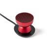 Red desktop microphone on black base.