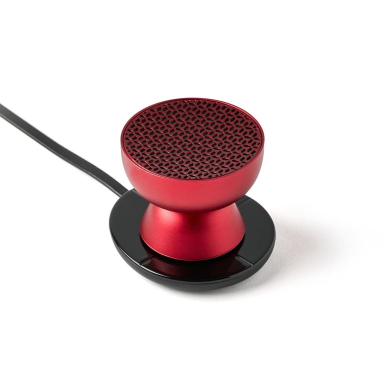 lexon tamo infinitely pairable bluetooth speaker red Red desktop microphone on black base.