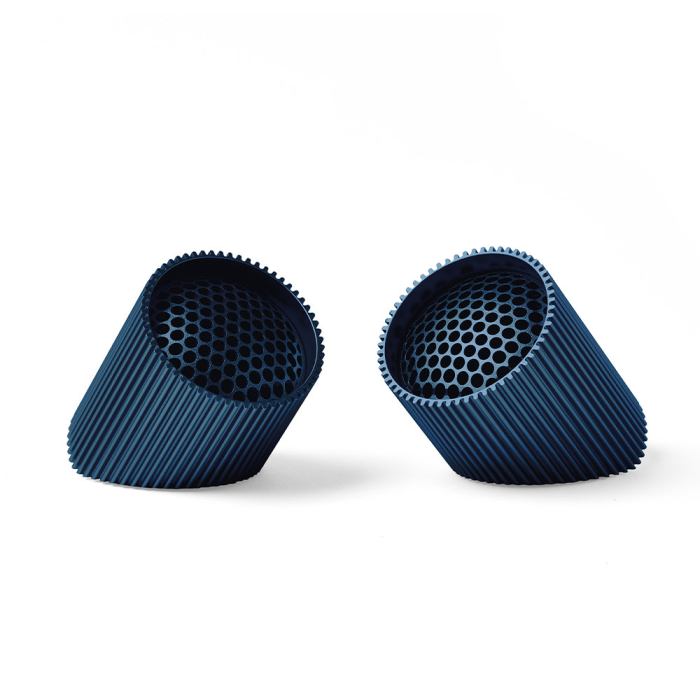 Two blue cylindrical air filters on white background.