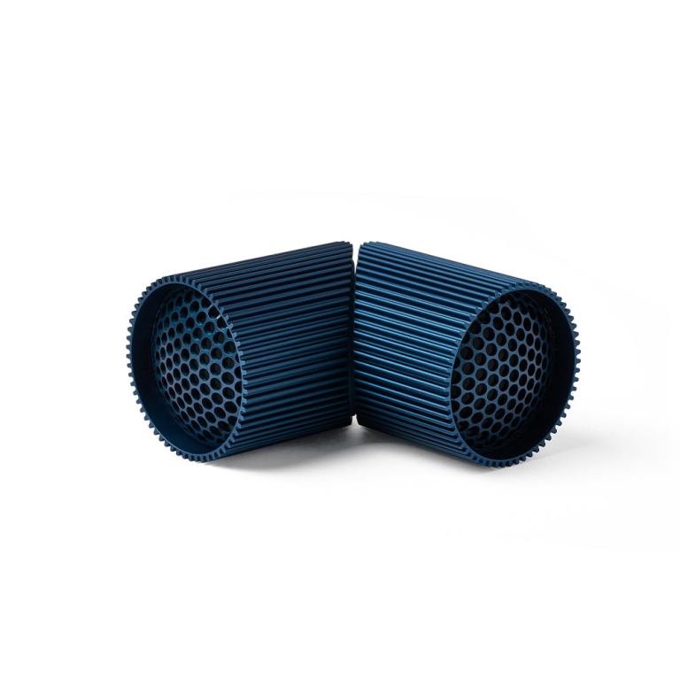 lexon ray set of magnetic bluetooth speakers blue Two blue cylindrical air filters on white background.