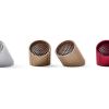 Five portable speakers in different colours and angles.