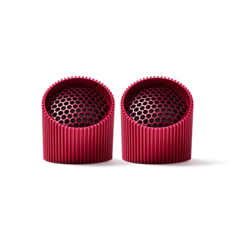 Two red mesh cylindrical caps.