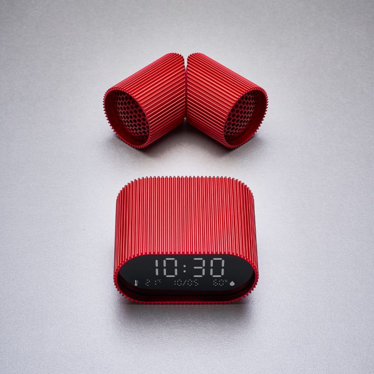 Red modern digital clock with ventilation tubes