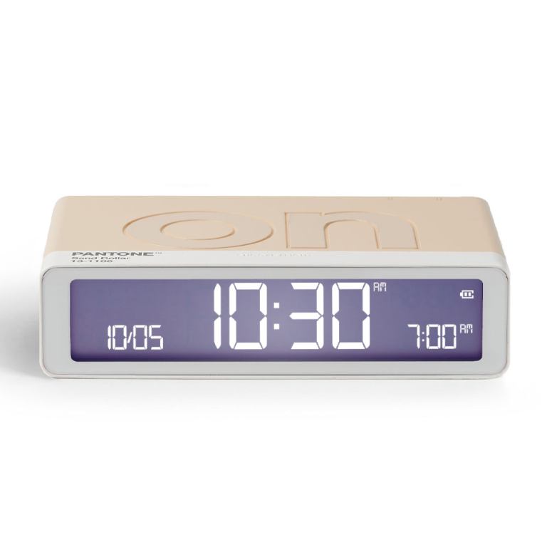 Digital clock displaying 10:30 AM with beige casing.