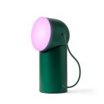 Green portable lamp with pink glow on white background.