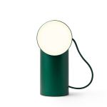 Modern green cylindrical table lamp with cord.