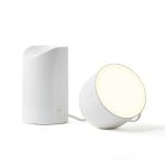 lexon orbe portable led lamp with moving head white Modern white lamp with cylindrical base and diffuser.