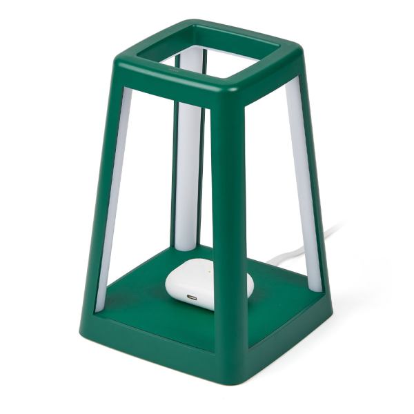 lexon lantern portable lamp with built in wireless charger green Green modern lamp with wireless charging base.