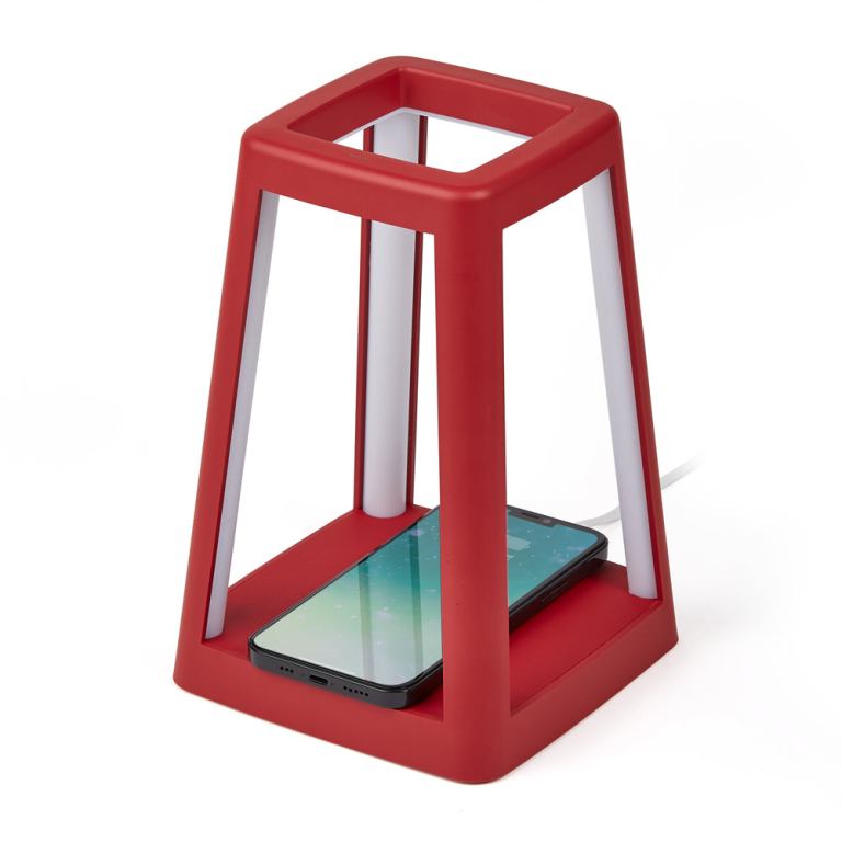 Red phone charger stand with smartphone