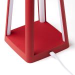Red lamp base with USB charging cable.
