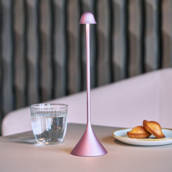 lexon steli bell infinitely pairable table lamp pink Modern table lamp with water glass and biscuits.