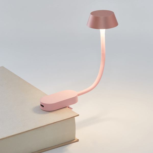 lexon mimi flexible led lamp pink Pink clip-on book light illuminating pages