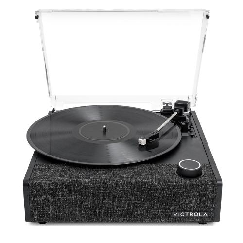 Black turntable playing a vinyl record