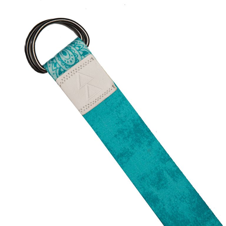 Turquoise yoga belt with floral design and D-ring.