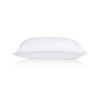 mediflow travel size waterbase fibre pillow 33 x 53 cm White pillow side view on white background.