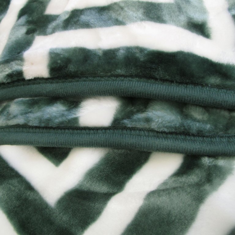 bloomington 800gsm greek key green winter premium quality 1 ply mink blanket double Close-up of green and white fluffy fabric