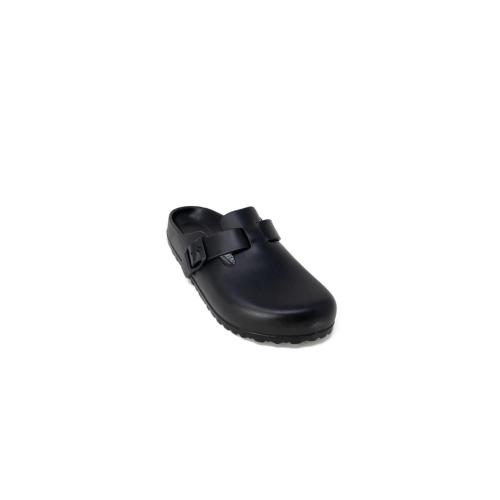 Black slip-on clog shoe with buckle.